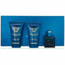 Versace Eros mini travel set featuring shower gel, aftershave balm, and fragrance in an elegant blue packaging.