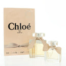 Chloe Eau de Parfum set featuring two bottles with elegant packaging and satin bows, perfect for floral fragrance lovers.