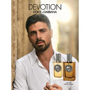 Devotion Eau de Parfum For Men by Dolce & Gabbana displayed with model wearing a white shirt and two fragrance bottles.