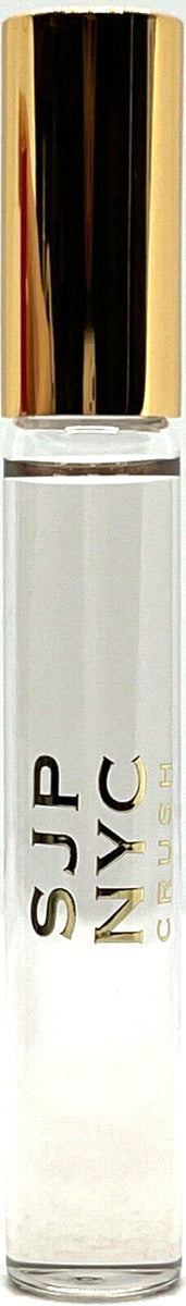 SJP NYC perfume rollerball in a sleek glass bottle with a golden cap, perfect for on-the-go fragrance application.